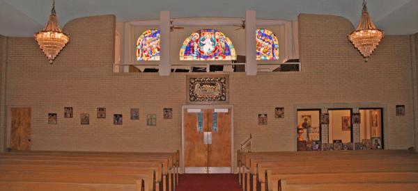 West wall, including choir loft, showing Christ in Judgment stained glass windows