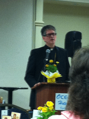 Bishop Anthony speaking at the Women's Meeting and Luncheon